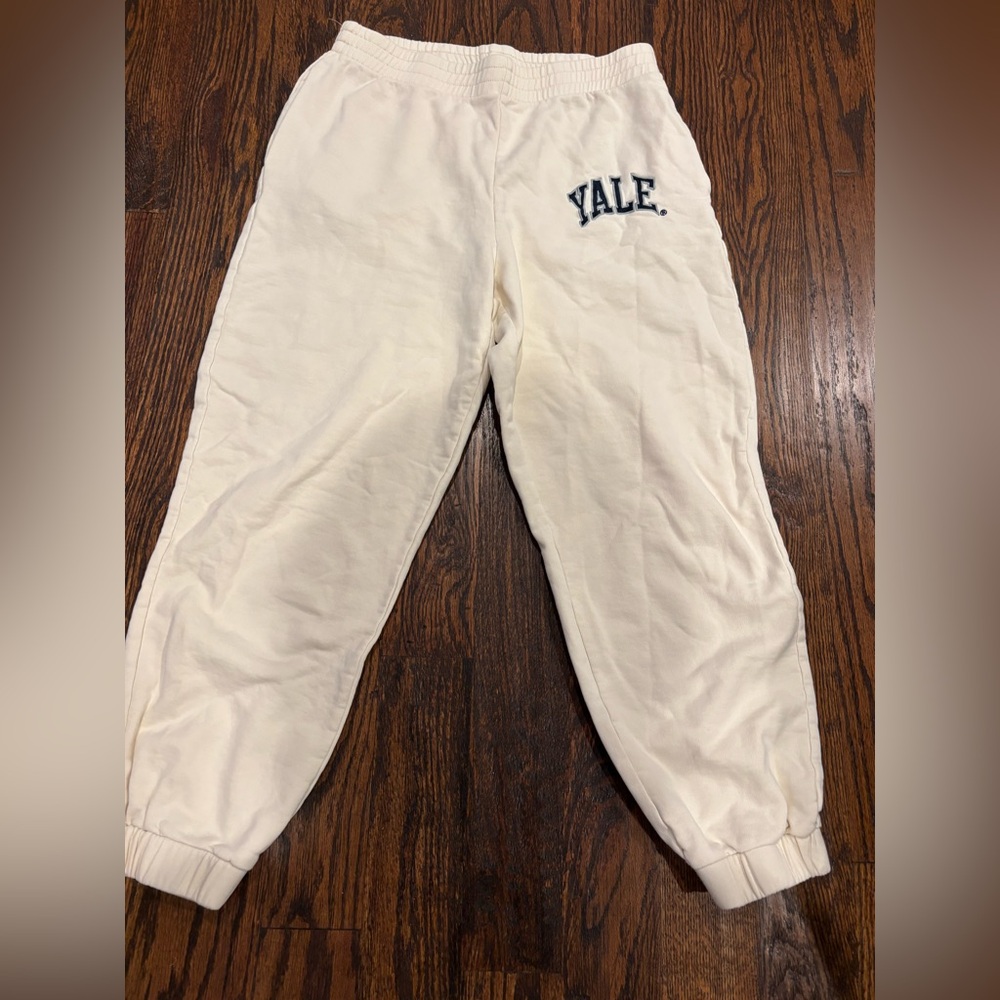 Cream sweatpants. Yale logo